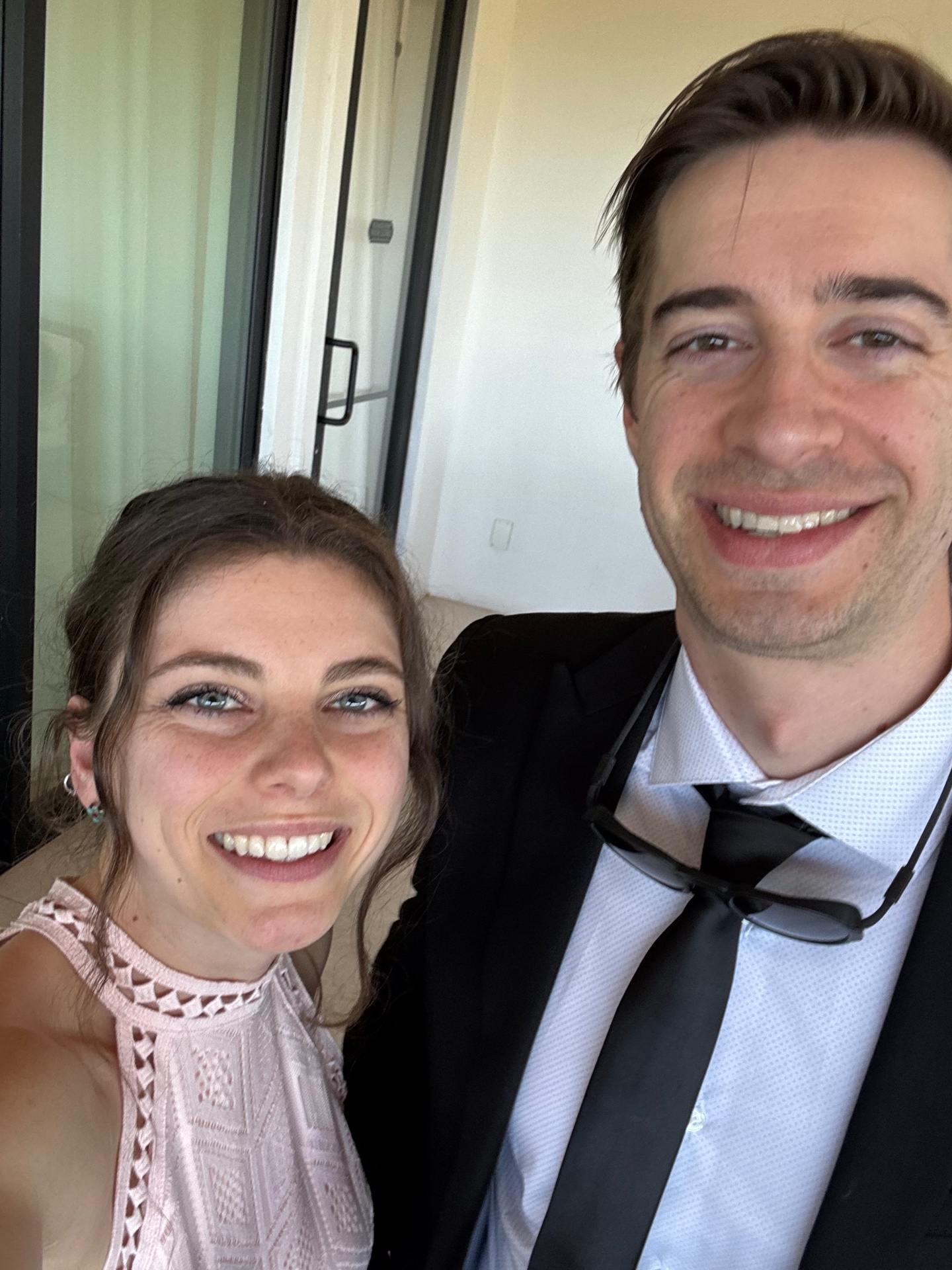 Dalton and Sarah dressed up and smiling together